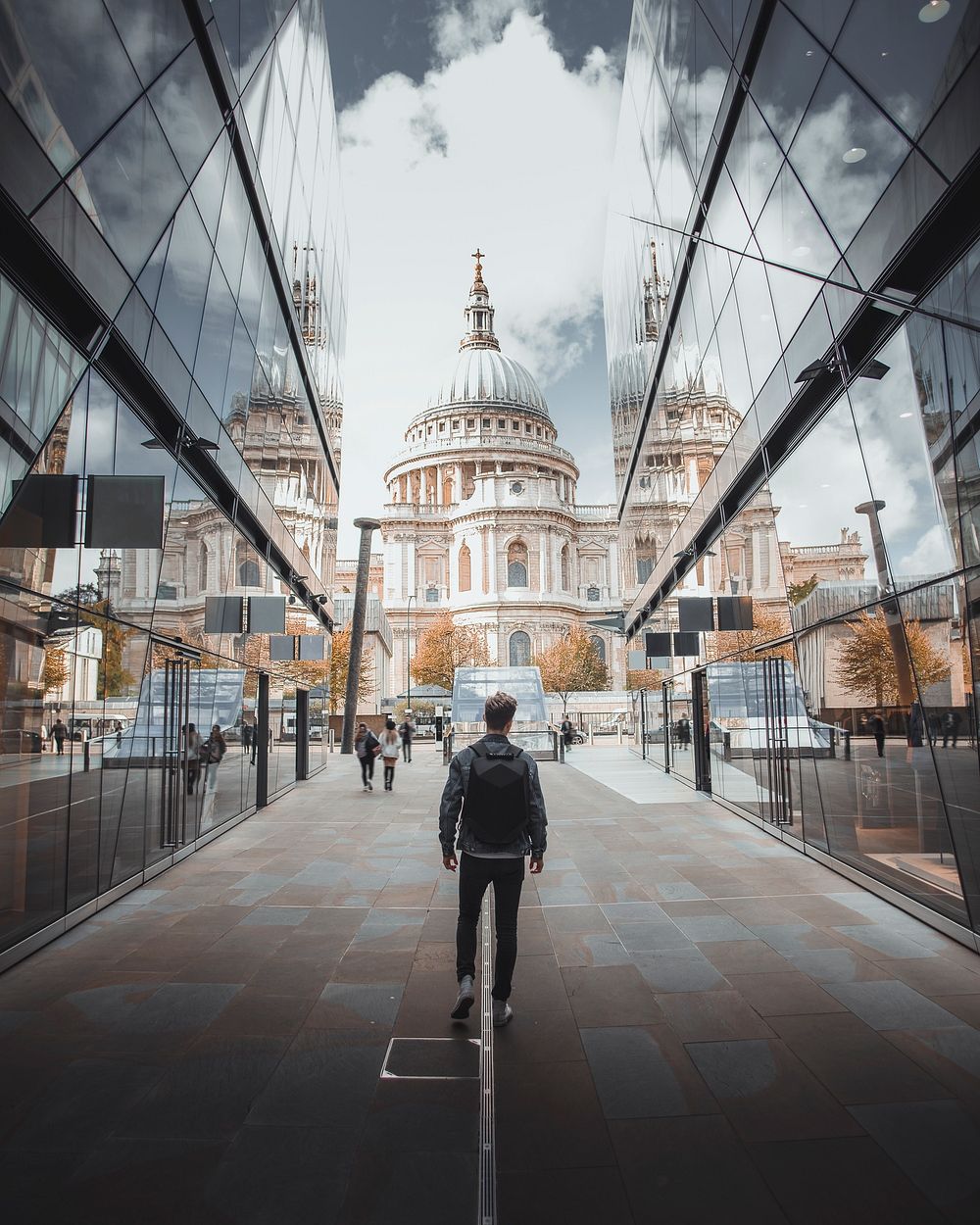 Man walking towards St. Paul's Cathedral in central London