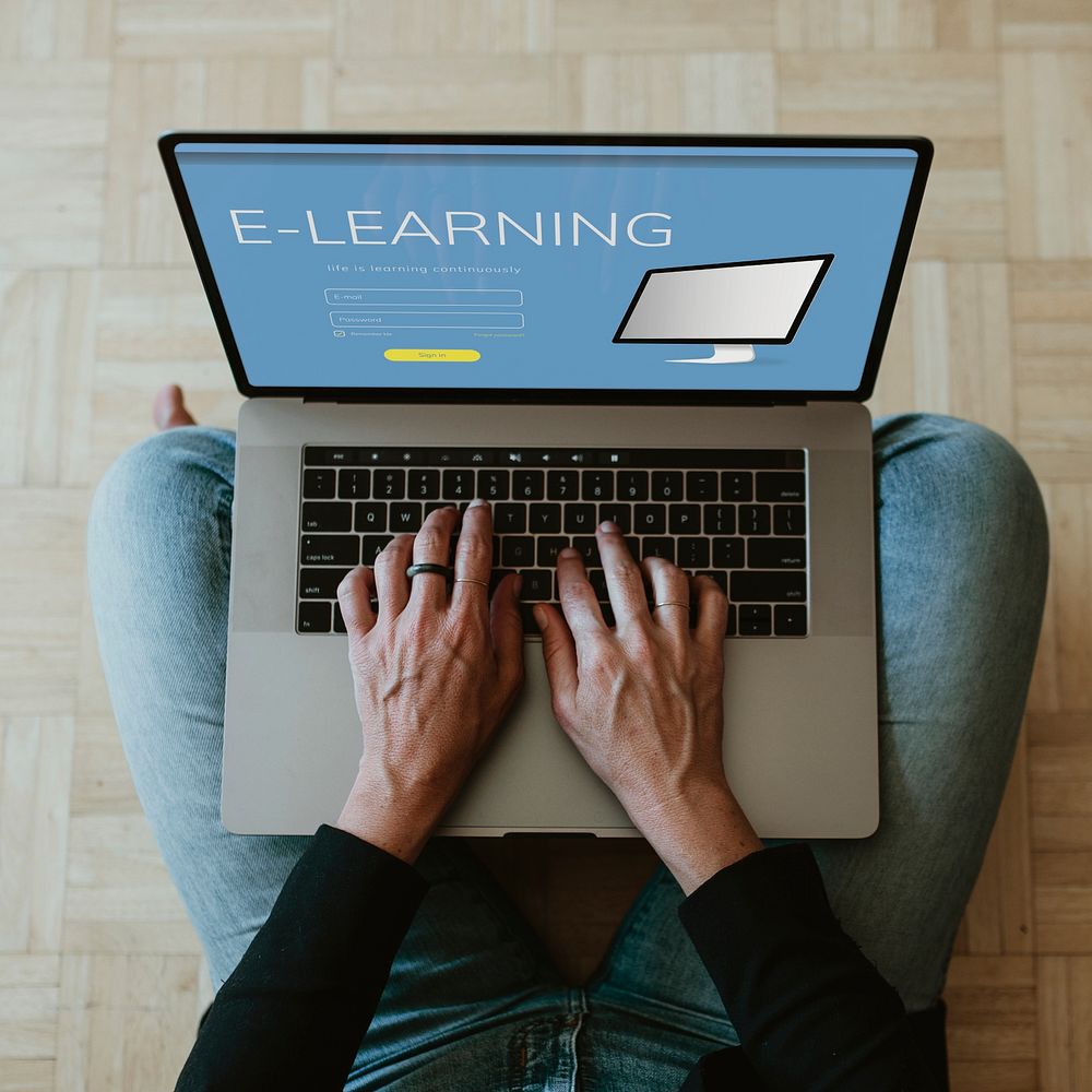 Woman using a laptop mockup to study at home during the coronavirus pandemic