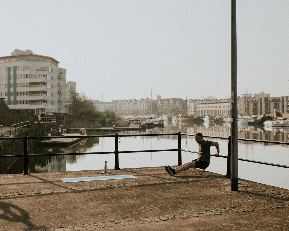Man working out by the canal in a quiet Bristol due to the covid-19 pandemic. APRIL 10, 2020 - BRISTOL, UK