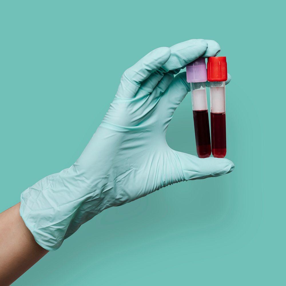 Hand holding a blood test tube mockups