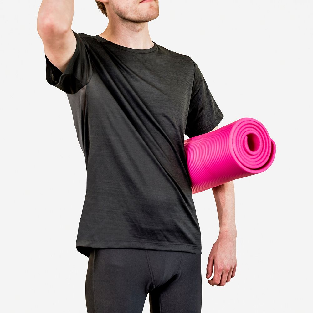 Man in black sport shirt with pink yoga mat