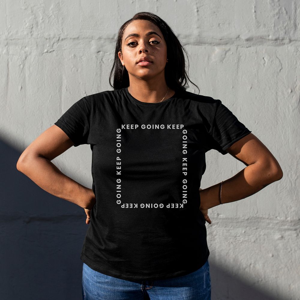 Keep going t-shirt mockup psd black women&rsquo;s simple streetwear outdoor shoot
