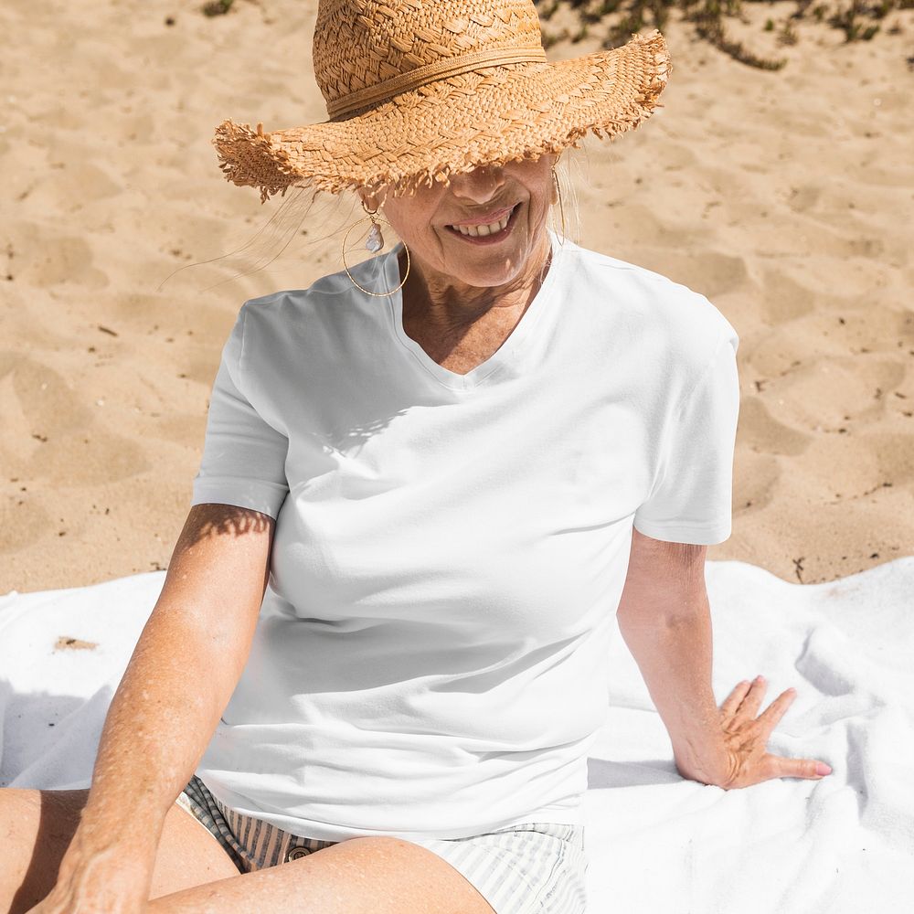 Women&rsquo;s white tee psd mockup beach apparel photoshoot