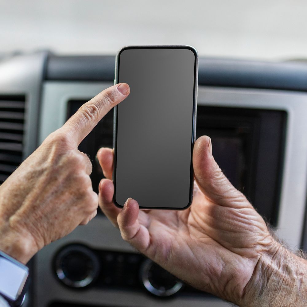 Smartphone black screen mockup psd with car interior background