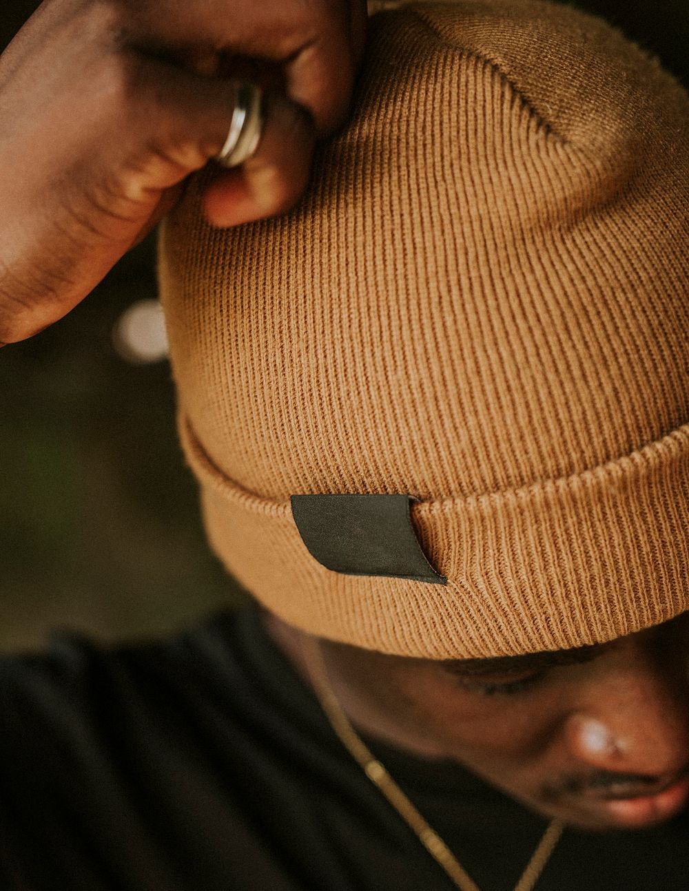 Tan knit hat label mockup men's apparel