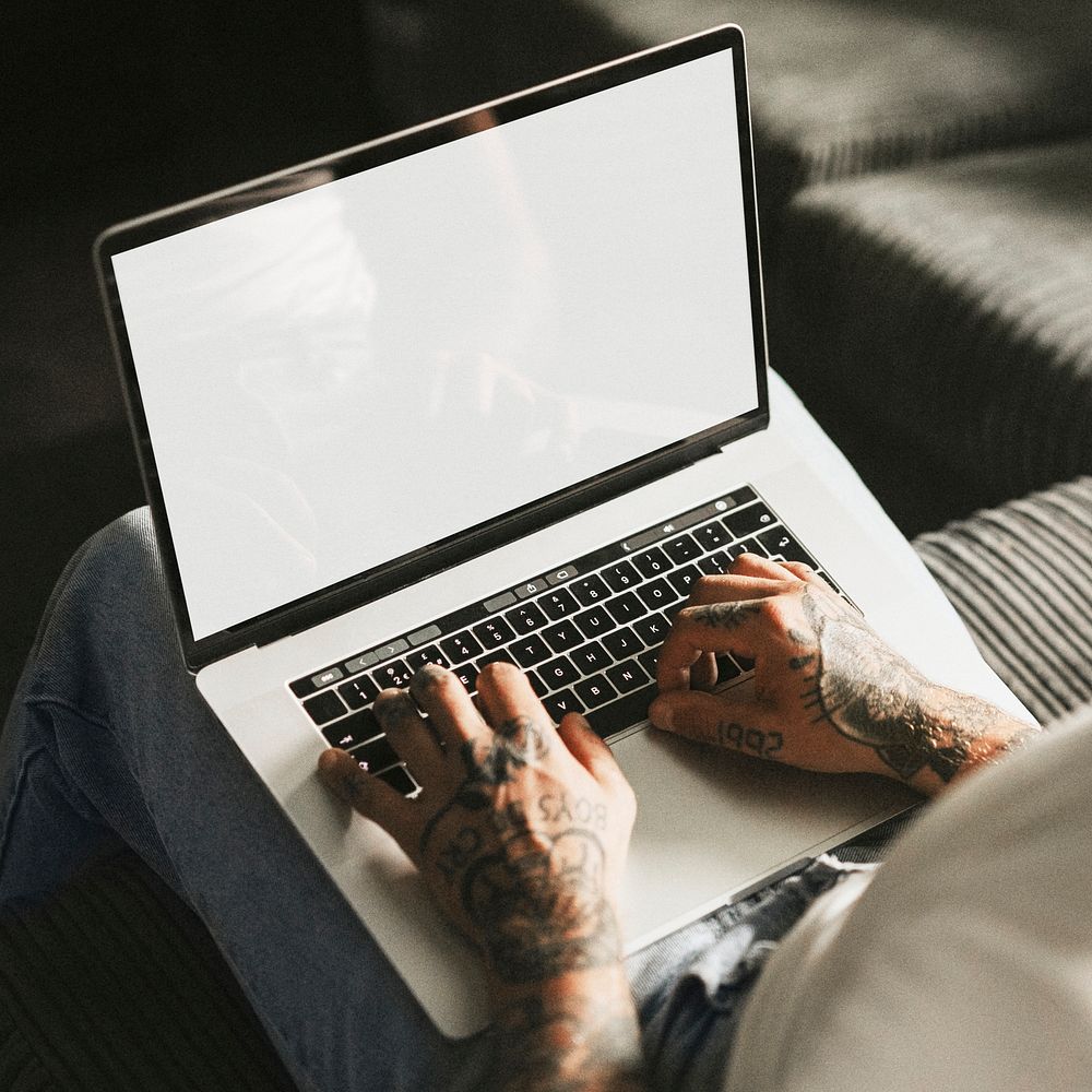 Man working on laptop mockup psd digital device