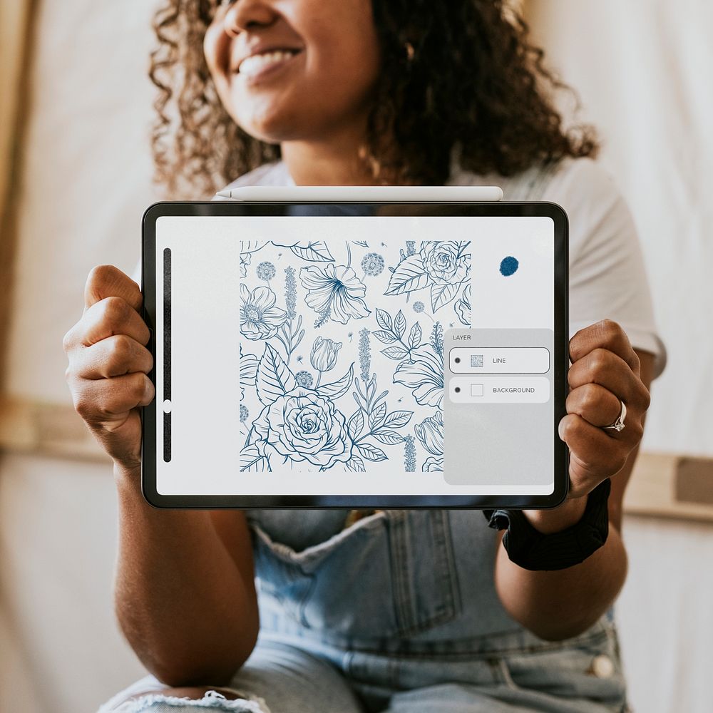 Digital tablet screen mockup psd, woman artist showing her own drawing on the tablet 