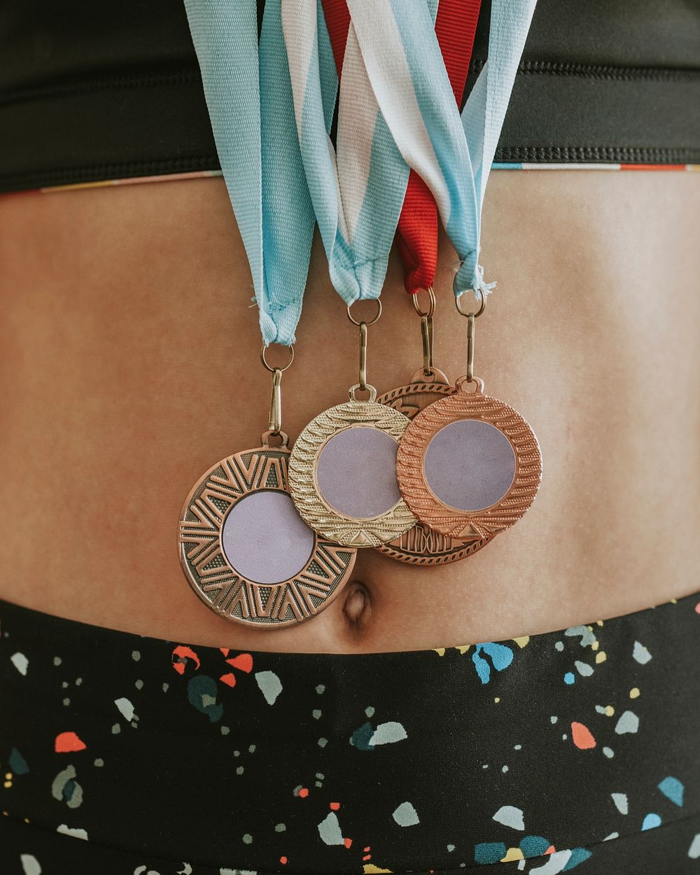 Young gymnast with many medals