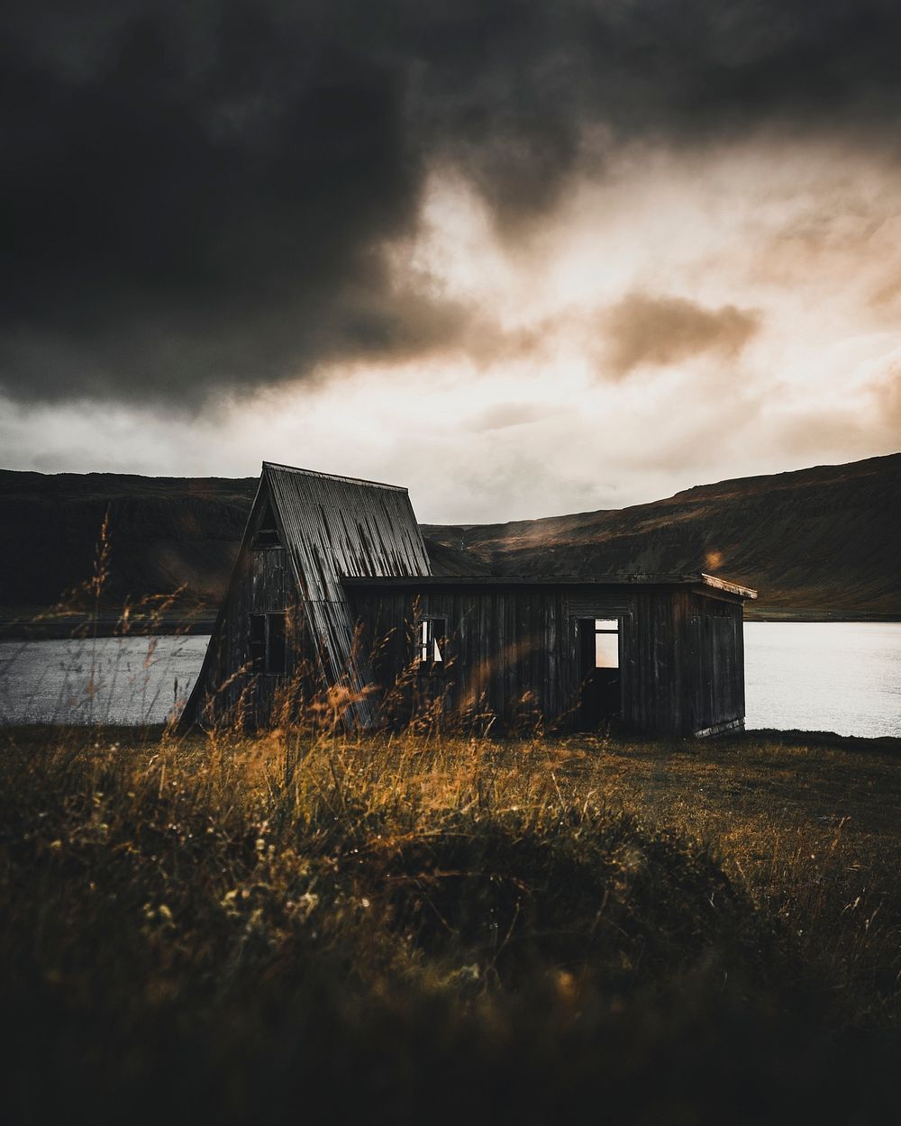 Abandoned cabin by a lake in Iceland