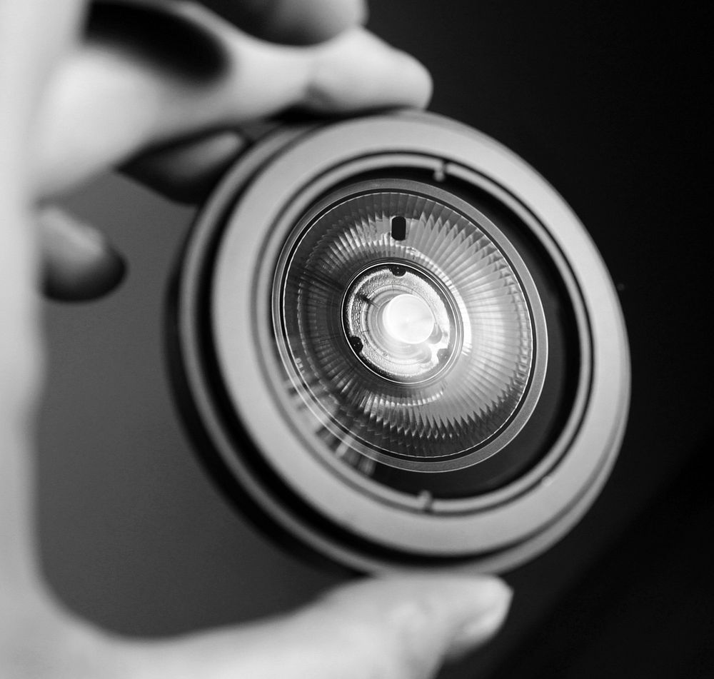 Greyscale close up of a camera lens