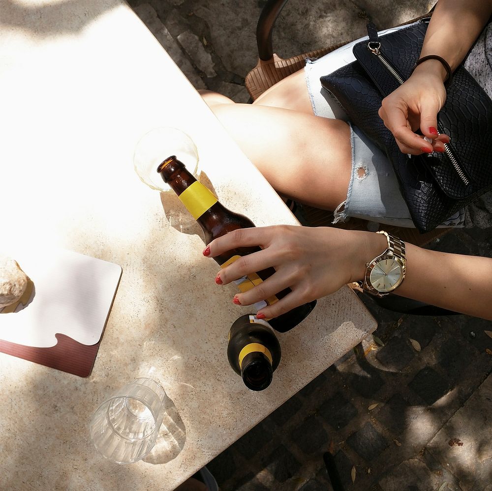 Woman chilling while have a beer
