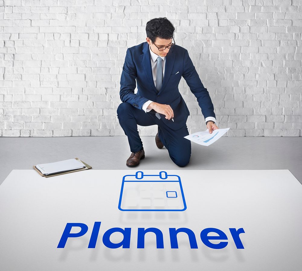 Man planning with illustration of personal organizer calendar