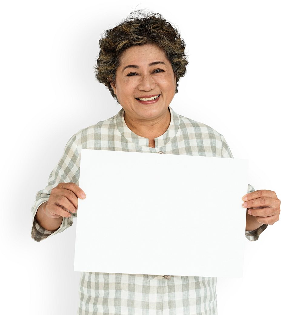 Senior lady holding a blank placard