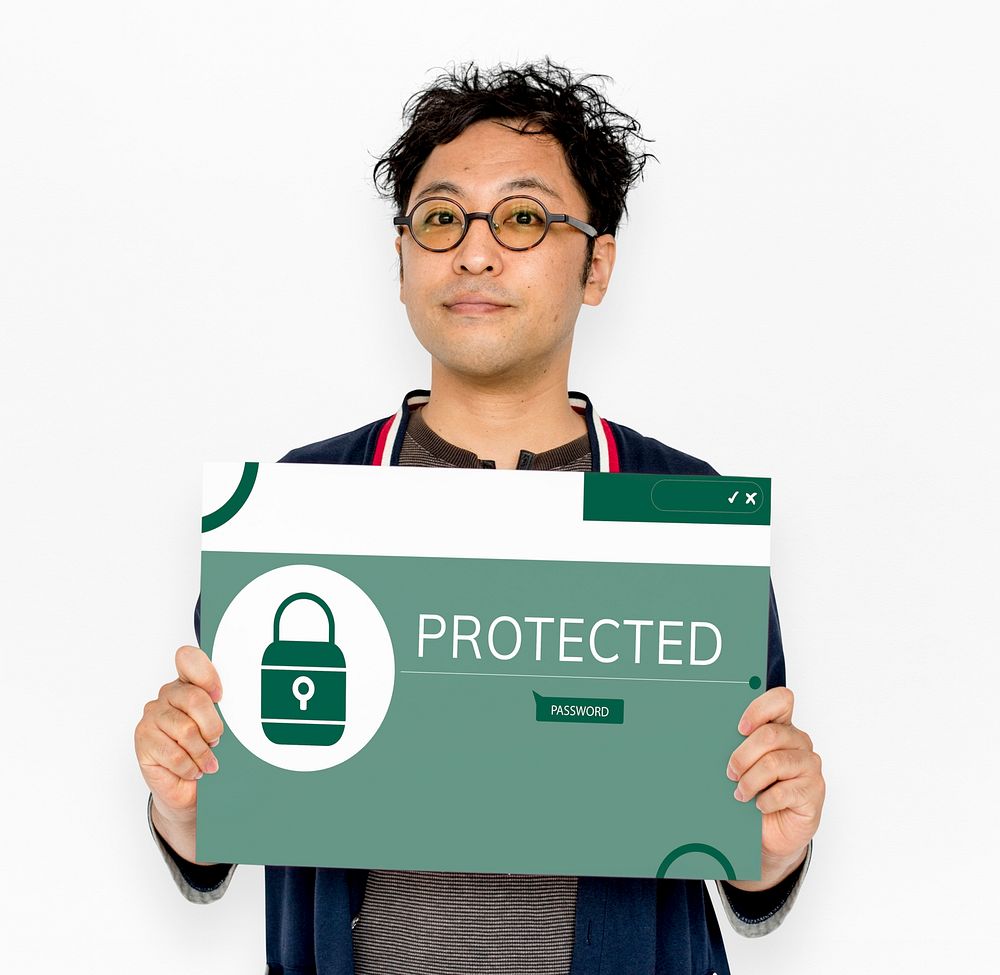 Man holding banner with illustration of computer security system