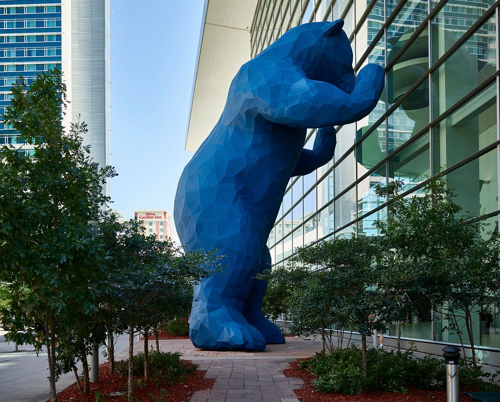 Lawrence Argent's "I See What You Mean," a giant blue bruin peeking into the Denver Convention Center in downtown Denver.…