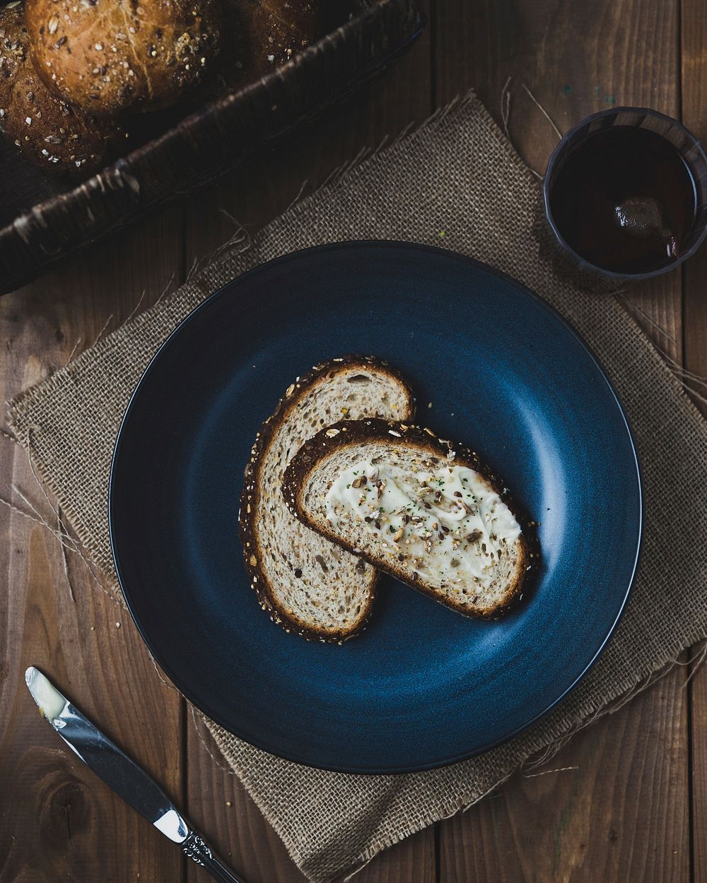 Free slice bread with seeds and butter image, public domain food CC0 photo.