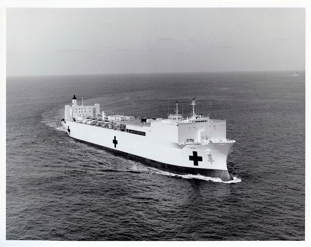 Pacific Ocean A starboard bow view of the hospital ship USNS Mercy (T-AH-19) underway during sea trials. 4 Apr 1986 [Ship]…