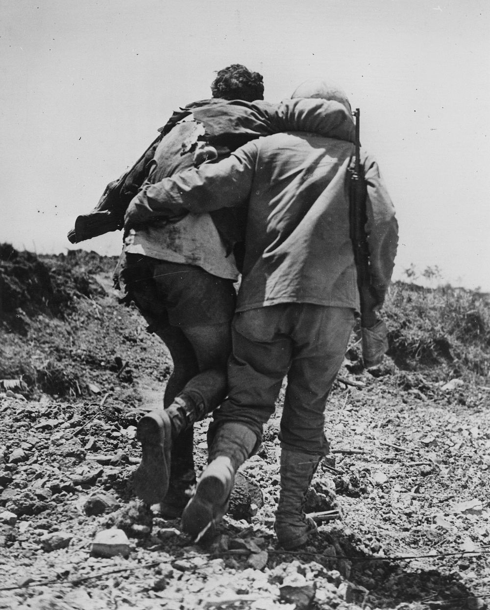 V-E Day, Okinawa Style - This marine observed V-E Day on Okinawa by having his clothing blown from his back by a Jap[anese]…