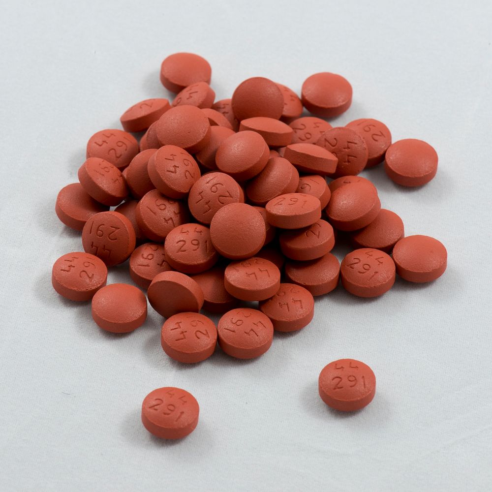 Pile of Ibuprofen tablets. Free public domain CC0 photo.