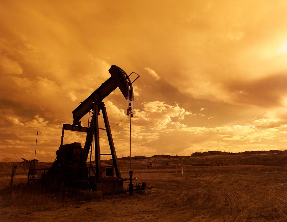 A pump jack is silhouetted against the sunset at Naval Petroleum Reserve near Casper, Wyoming.
