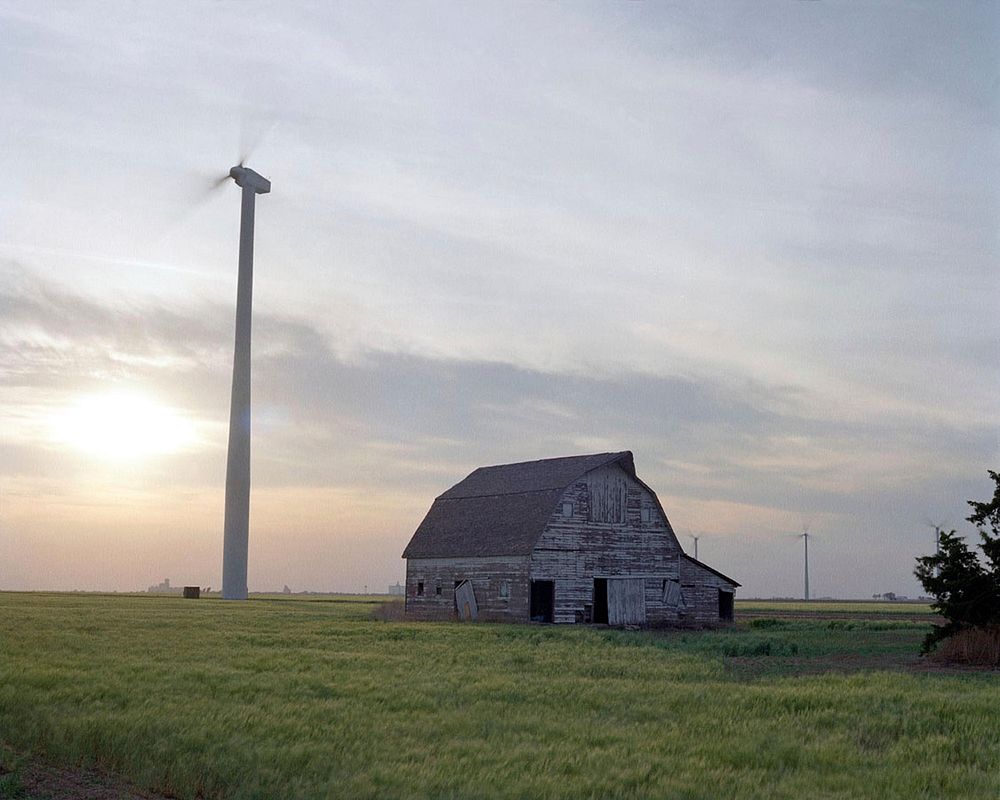 Wind farm in Kansas during sunrise. Original public domain image from Flickr