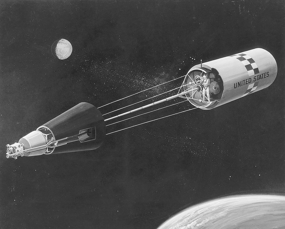 Artist's conception shows a manned space laboratory powered by a nuclear reactor (extreme left). Original public domain…