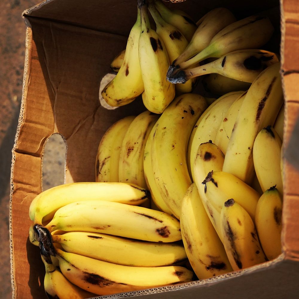 Pile of bananas in box. Free public domain CC0 photo.