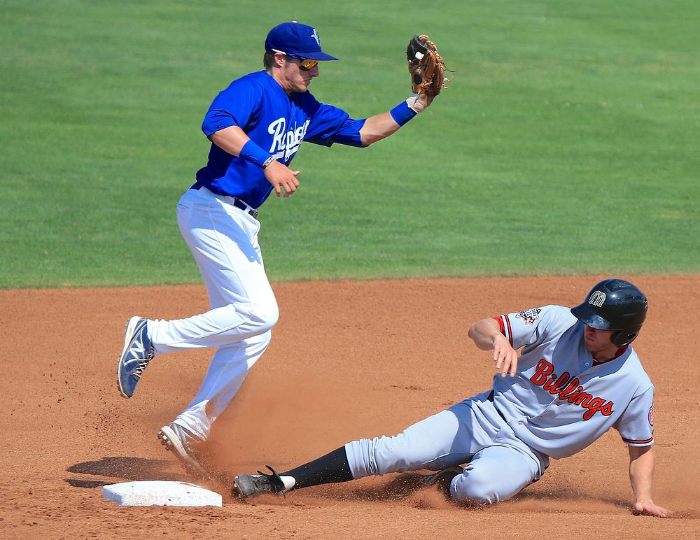 baseball-player-doing-straight-leg-slide-free-photo-rawpixel