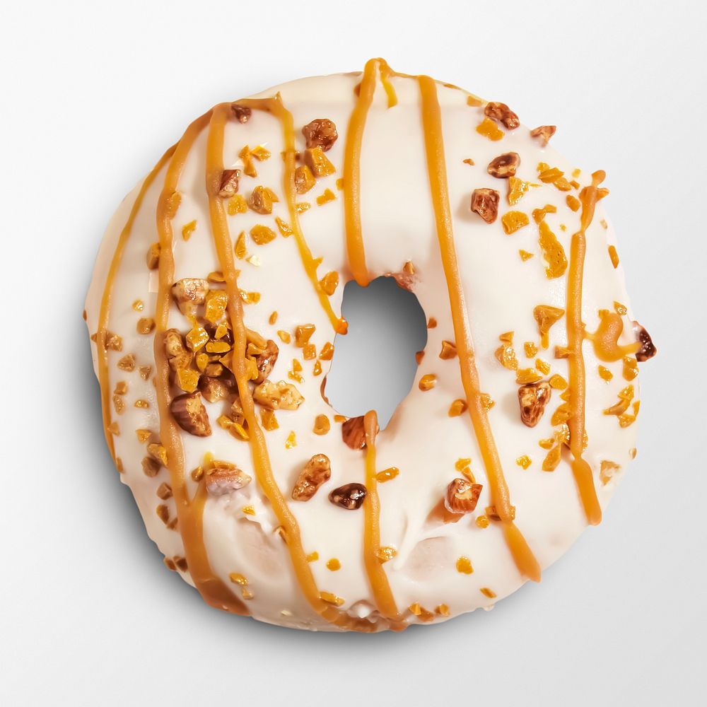 Frosted donut on white background, food photography