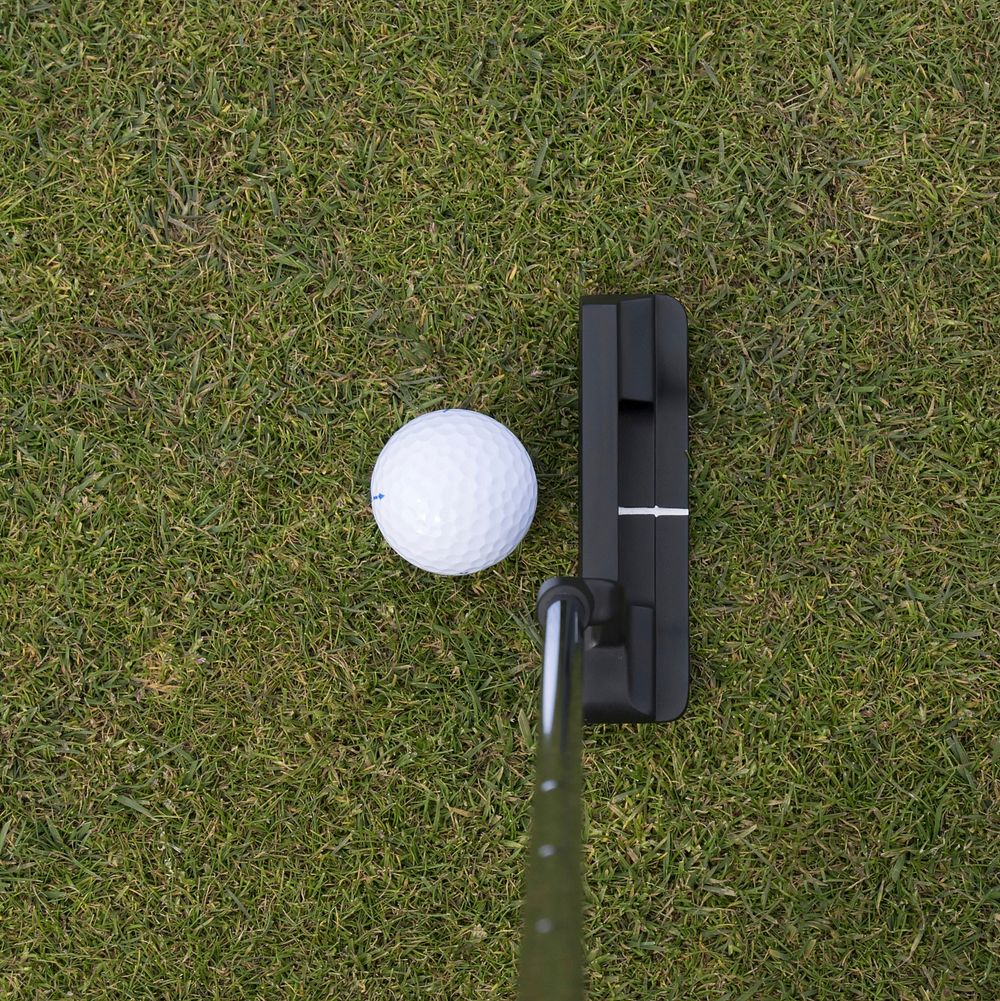 Closeup on golf club head and ball. Free public domain CC0 image. 
