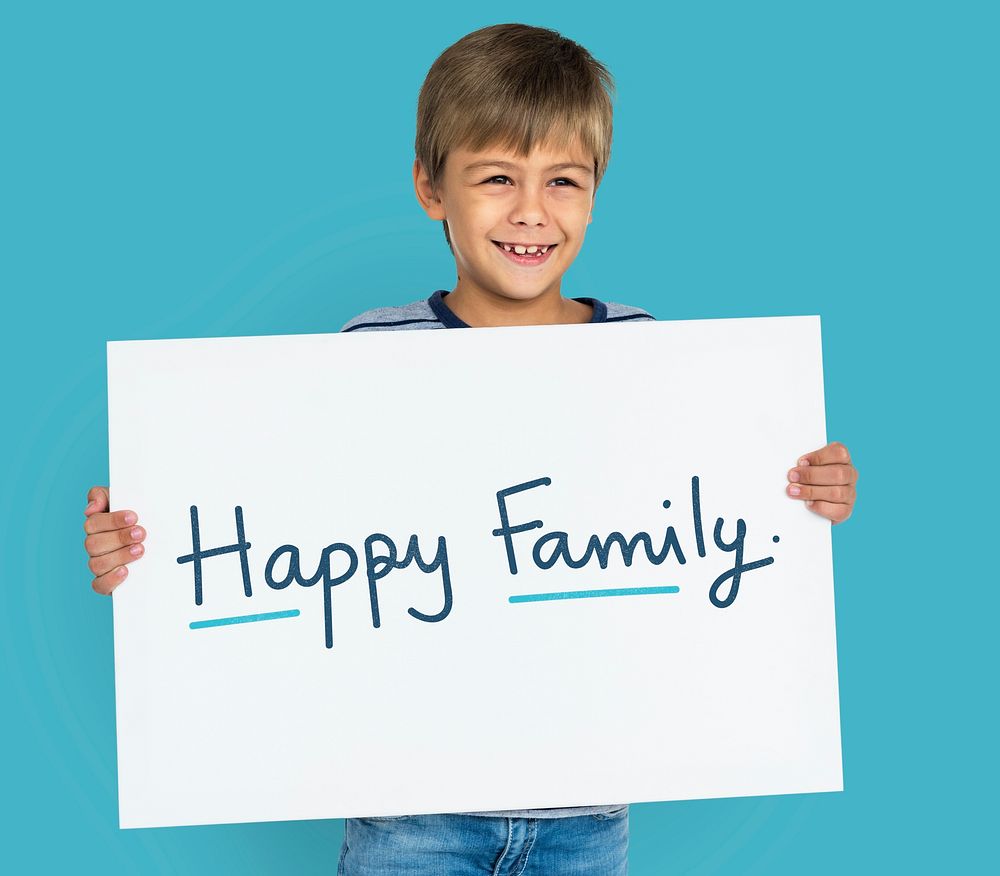 Young boy holding a Happy Family poster