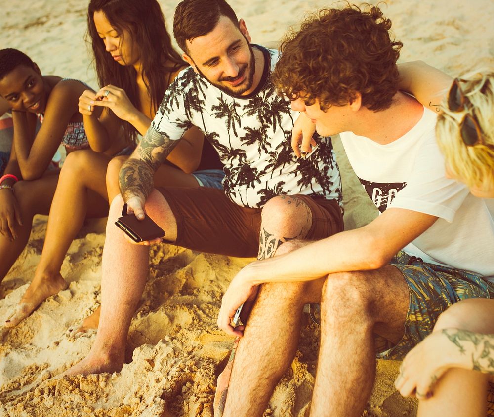 Friends spending the evening at the beach