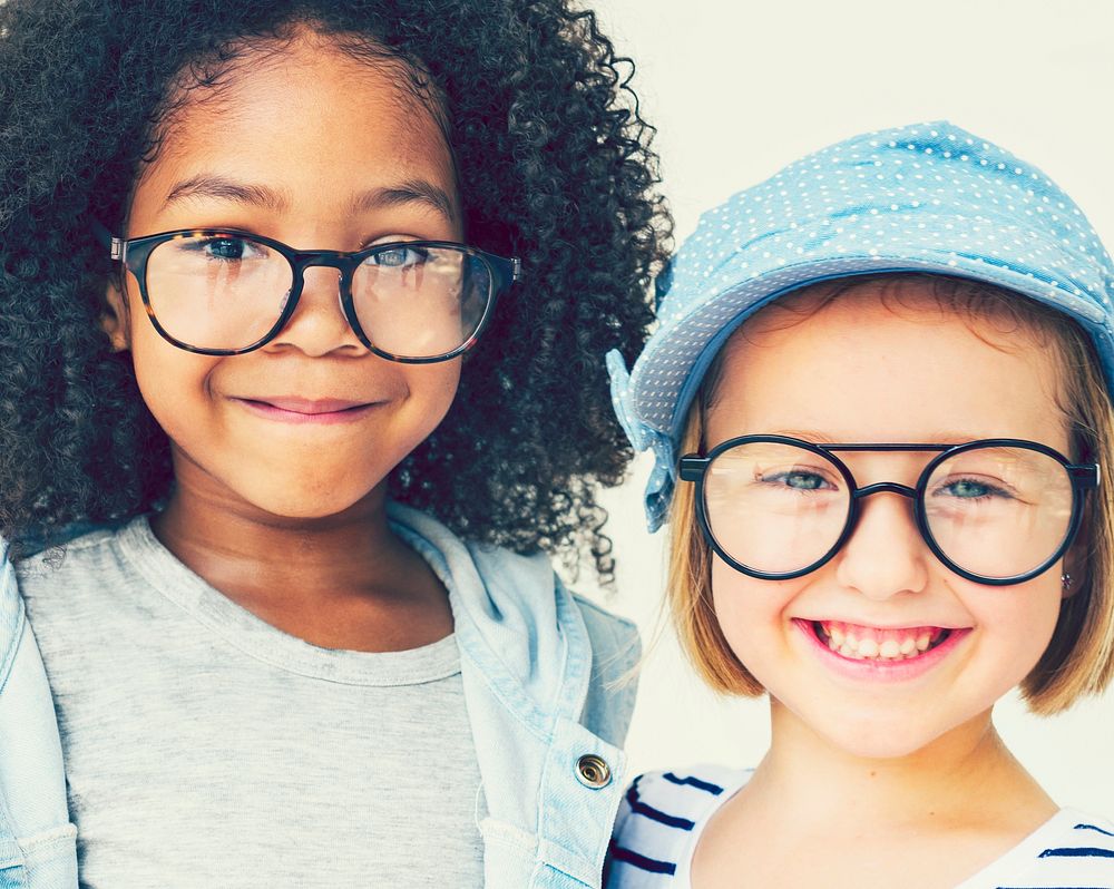 Cute little girls with glasses