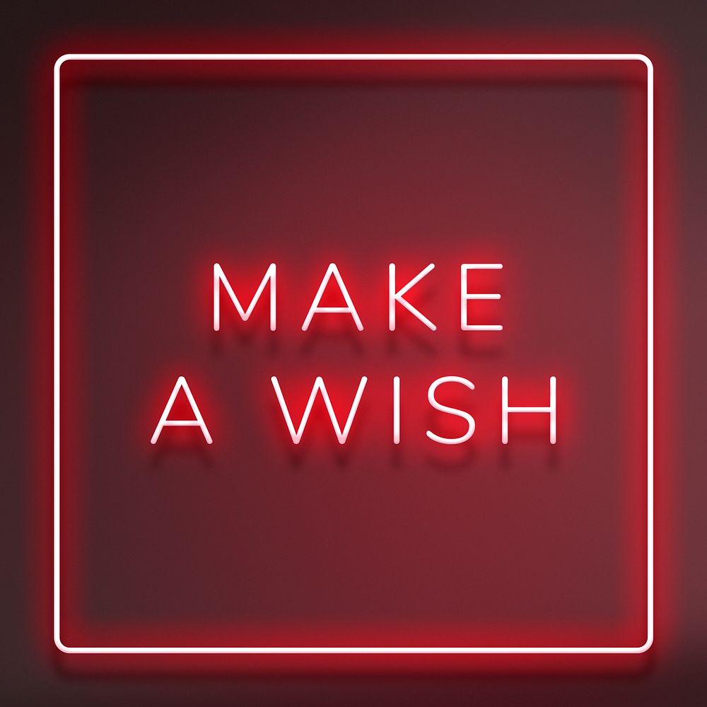 Glowing make a wish neon typography on a red background