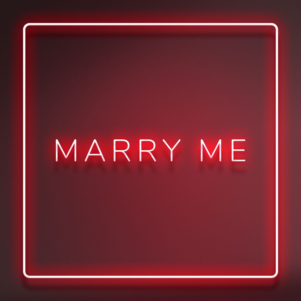 Glowing Marry me neon typography on a red background