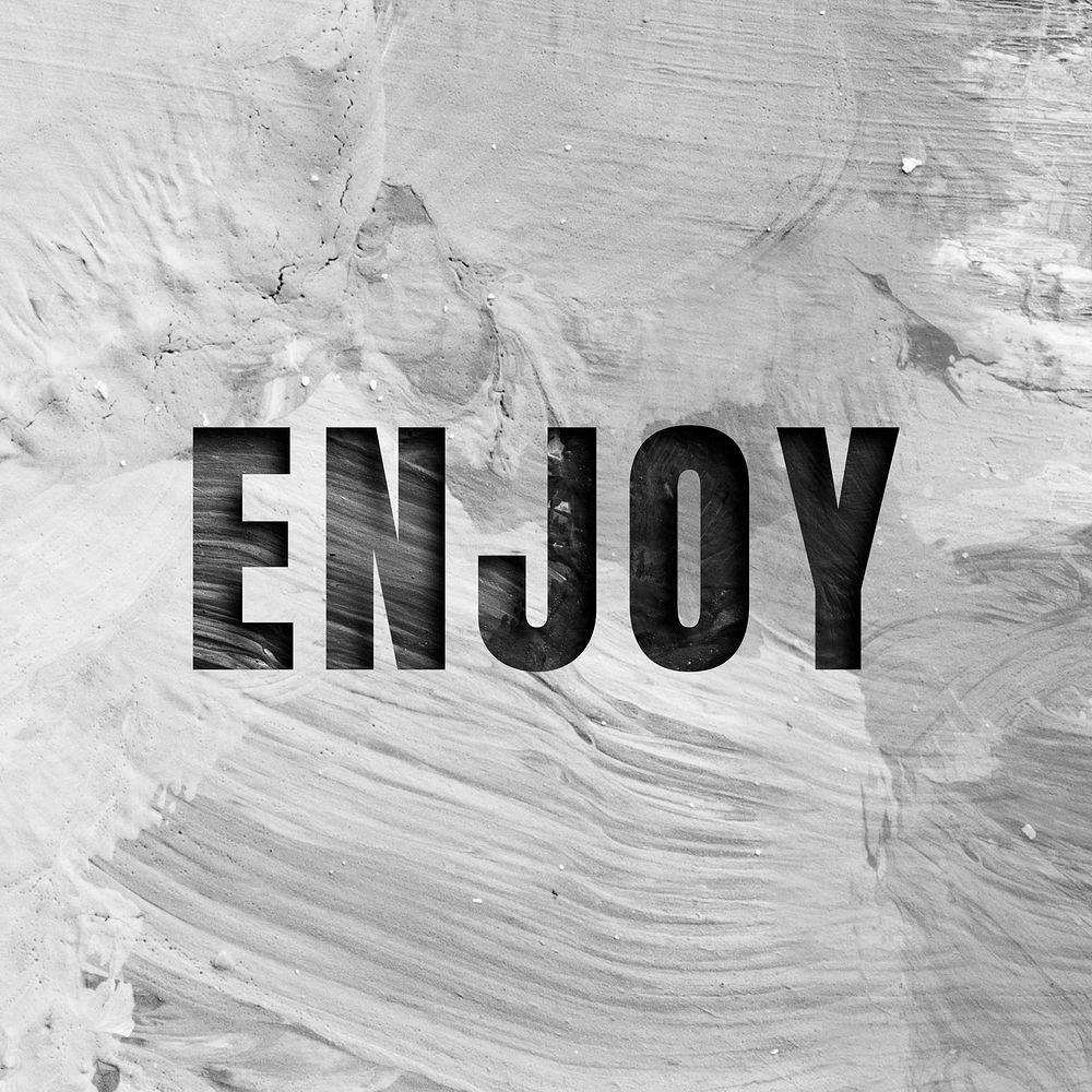 Enjoy uppercase letters typography on brush stroke background