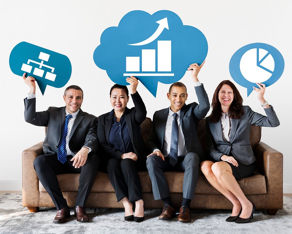 Diverse business people holding speech bubbles with development icons