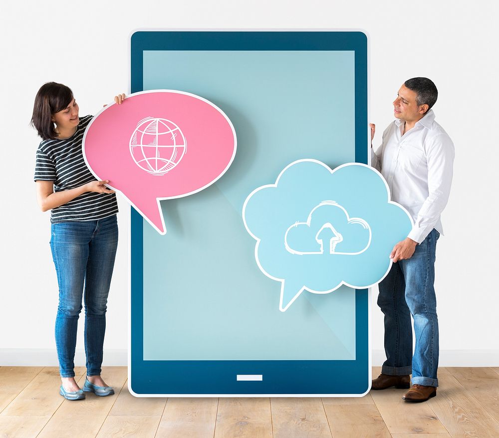 Couple holding cloud networking speech bubbles