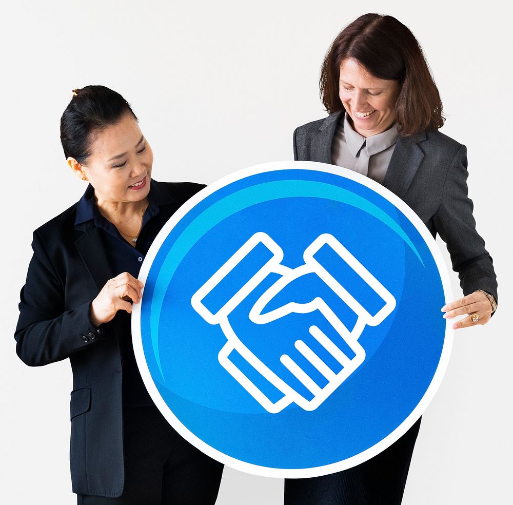 Businesswomen holding a handshake icon