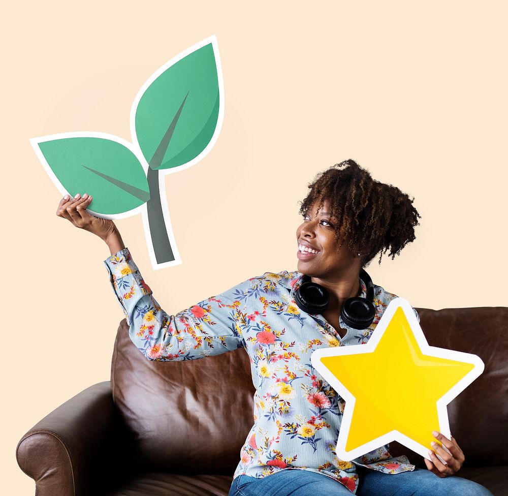 Woman holding a plant and star icon