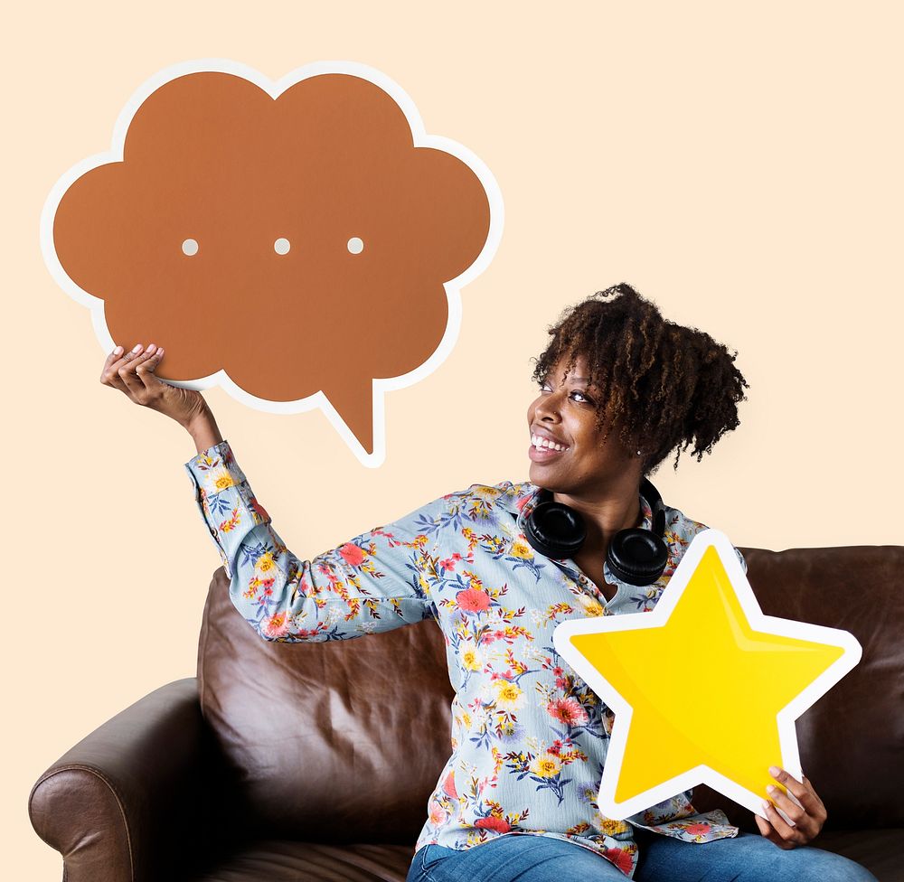 Woman holding a speech bubble and star icon