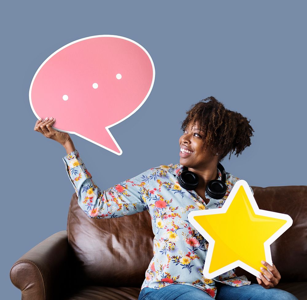 Cheerful woman holding a speech bubble and star icons