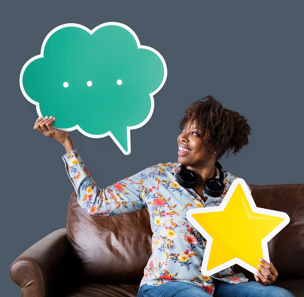 Cheerful woman holding a speech bubble and star icon