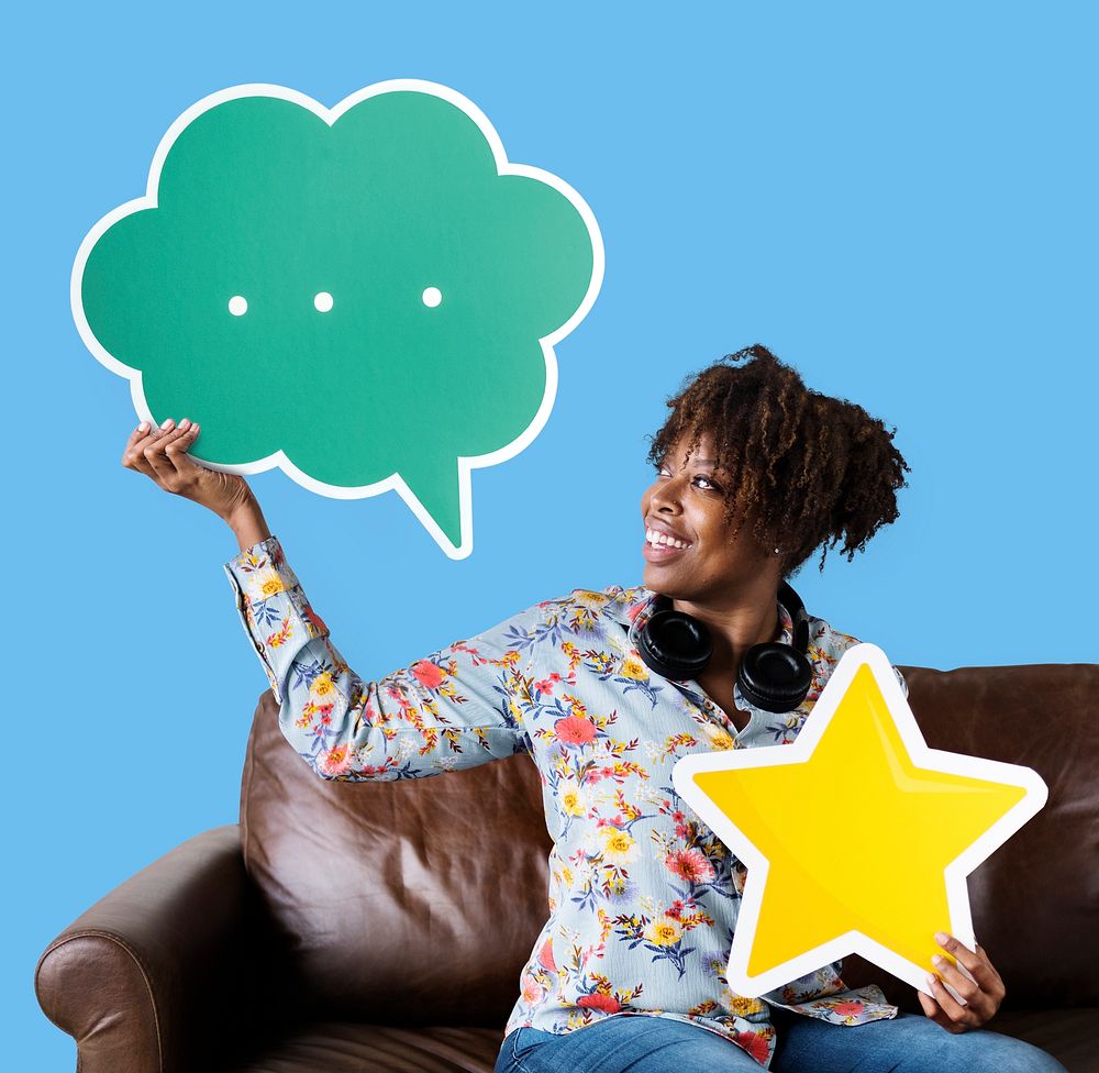 Cheerful woman holding a speech bubble and star icon