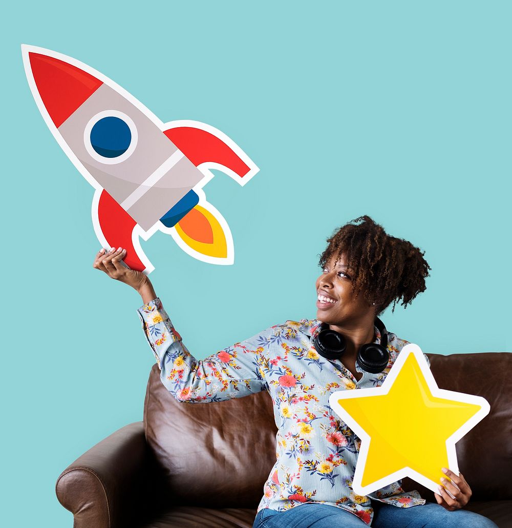 Cheerful woman holding rocket and star icons