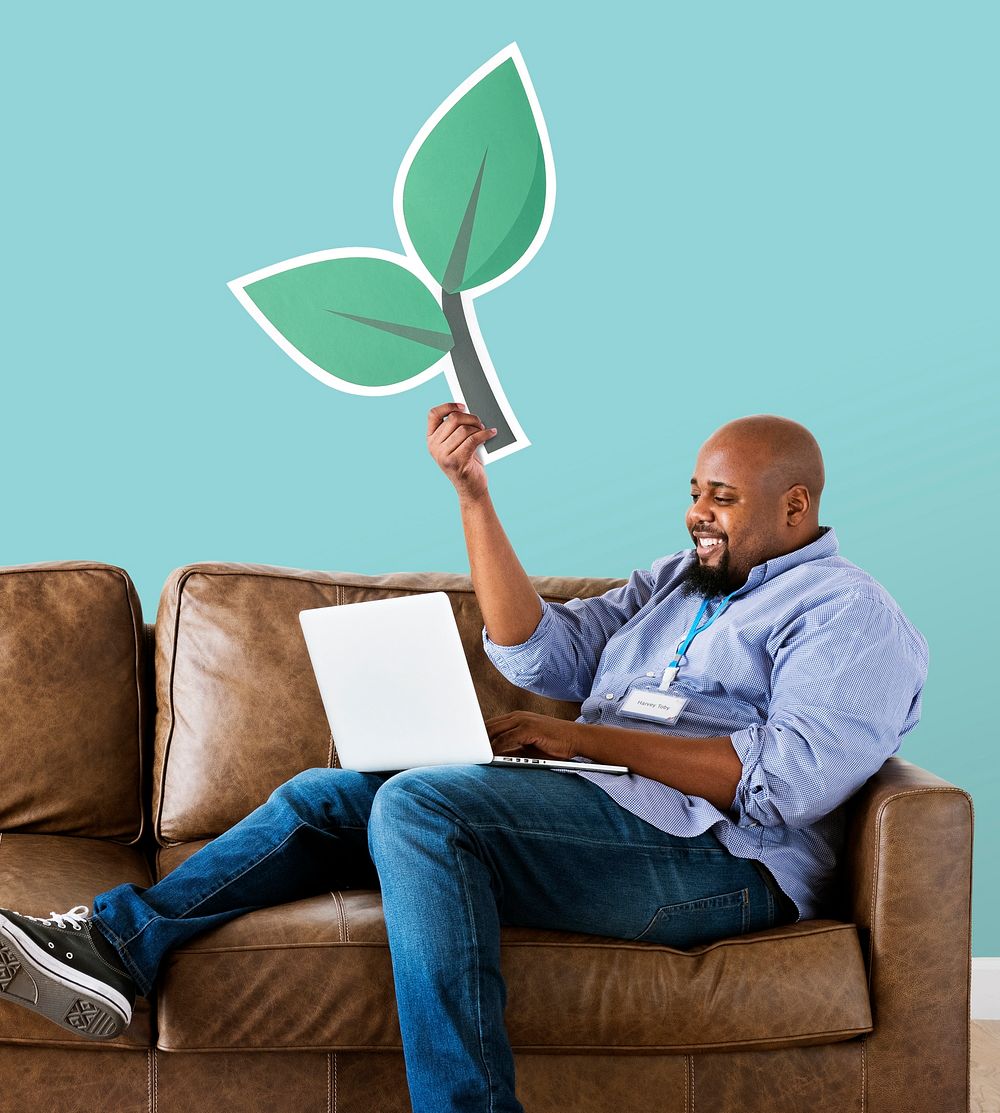 Man holding plant icon on couch