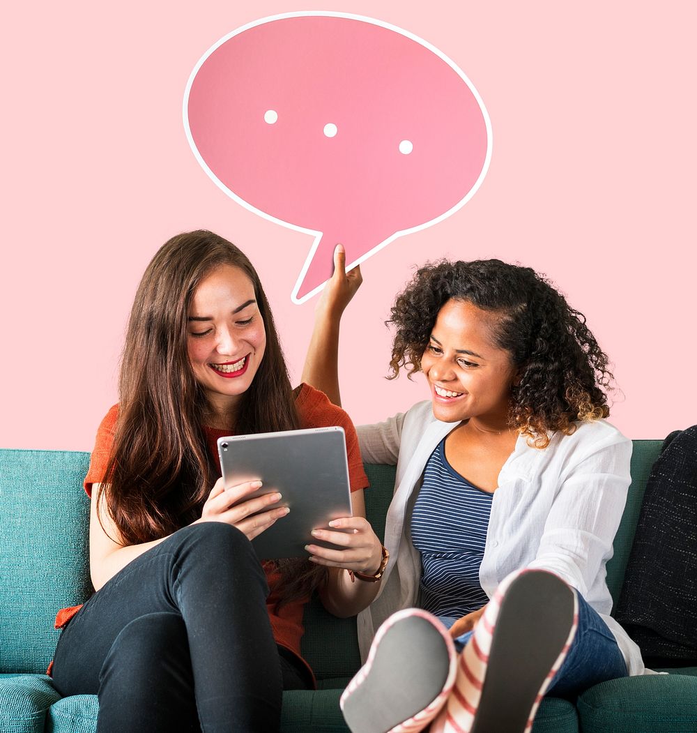 Women holding a pink speech bubble icon