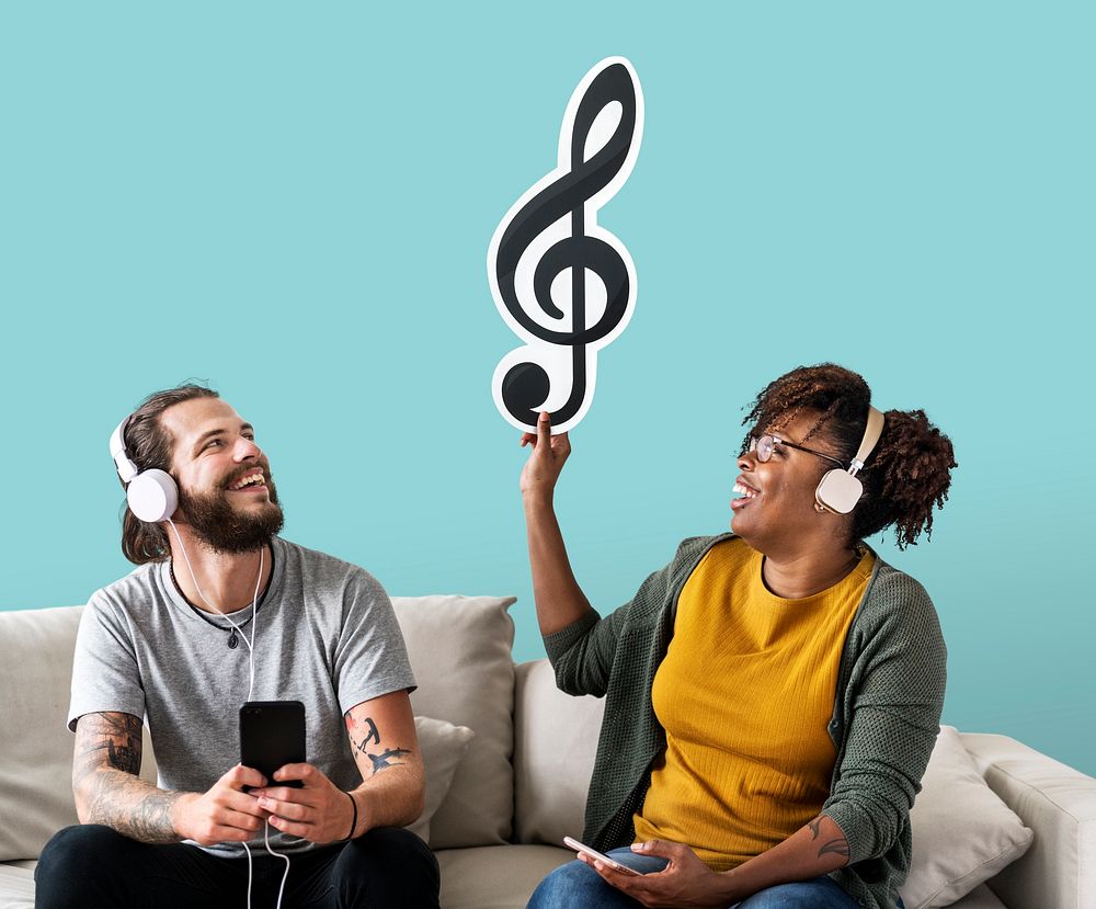 Interracial couple holding a musical note icon