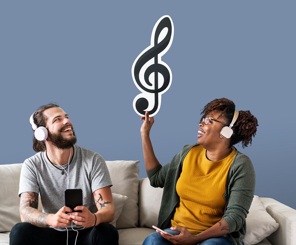 Interracial couple holding a musical note icon
