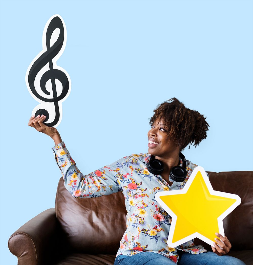 African American woman holding a musical note